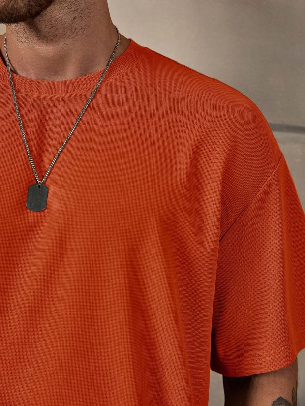 Loose Fit Men Solid Drop Shoulder T-Shirt & Shorts Set